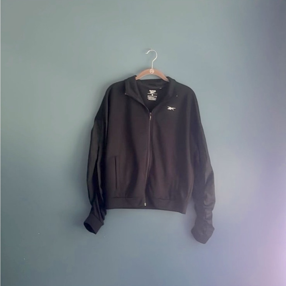 Reebok black zip up sweatshirt with windbreaker ruffle sleeves women size small